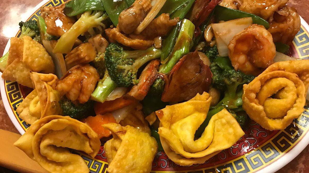 Subgum wonton at Wok N Roll at 789 Ga. 96 in Bonaire. The dish consists of fresh shrimp, chicken and roast pork sauteed with Chinese vegetables and baby corn surrounded by fried wontons, according to the menu.