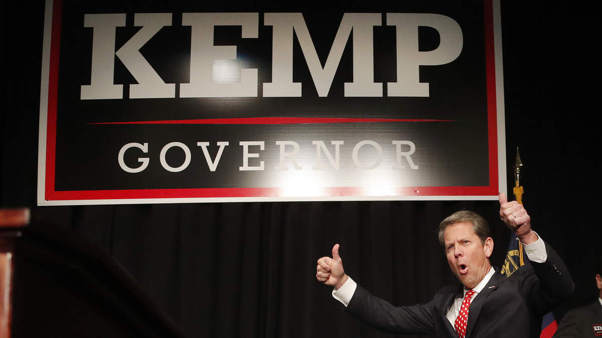 Georgia Republican gubernatorial candidate Brian Kemp gestures as he steps onstage to speak to supporters Wednesday in Athens.