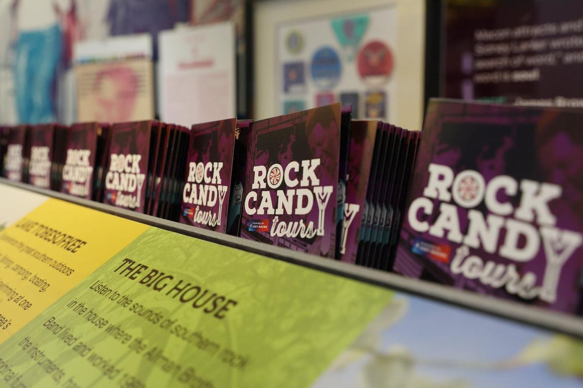 Rock Candy Tours brochures sit in the Visit Macon Downtown Visitors Center on Wednesday, Sept. 4, 2024, in Macon, Georgia. Rock Candy Tours gives tours exploring downtown Macon, including its music history, and will now be run through Visit Macon.