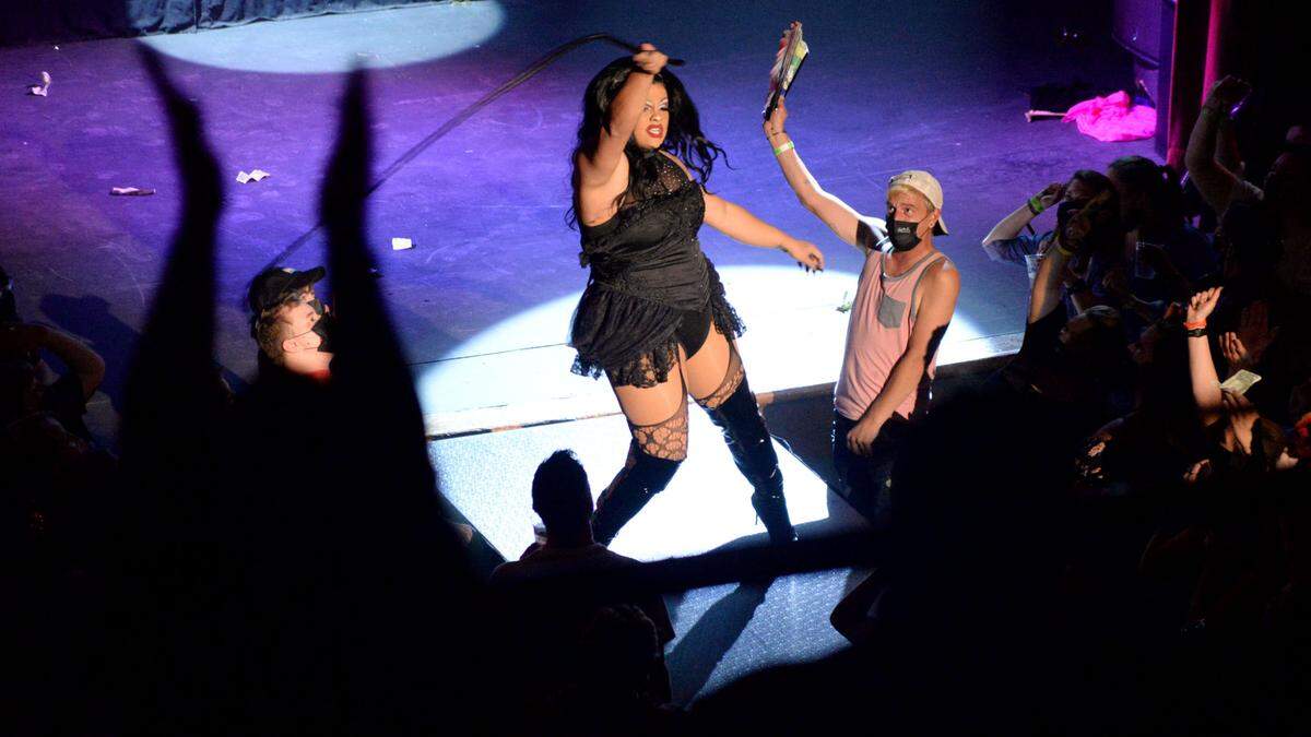 Pynk Dime pulls out a whip during her performance at the Hargray Capitol Theatre on Friday for Macon Pride’s House Party event featuring the well-known drag queen Lala Ri.