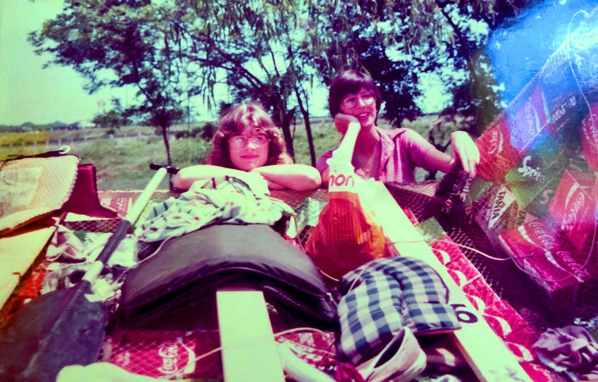 Kathleen O’Neal of Macon was in high school at Mount de Sales Academy in spring 1979 when she and her friends, Leslie Prescott, left, and Mary Dombrowski, built a raft for the annual Ocmulgee River race using cartons from syrup containers the school used for its soft-drink fountain.
