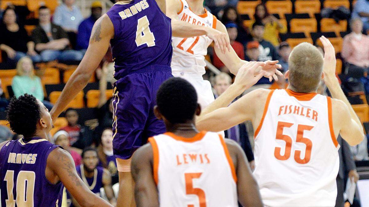 JASON VORHEES AND BEAU CABELL/THE TELEGRAPHSophomore Desmond Ringer (0, above) and freshman Ethan Stair (22, right) are new to the Mercer men's basketball team, but both have undergone almost no transition and have stepped in to help the Bears to their best start as a Division I program, as well as earning a spot in the College Mid-Major top 25. Ringer sat out last season after transferring from South Carolina, and Stair is from Alabama.