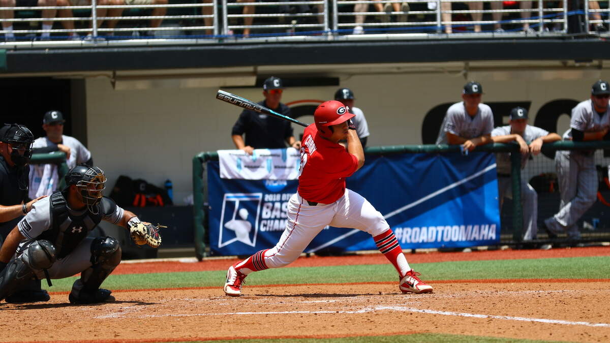 Michael Curry (13) makes contact on the ball in Georgia's opening game against Campbell in the 2018 NCAA Tournament.