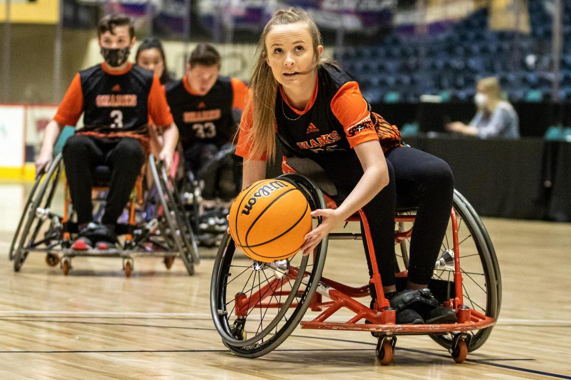 Houston County’s Miranda Lawhorn (55) scoops up the ball against the Gwinnett Heat in the GHSA Championship March 13.