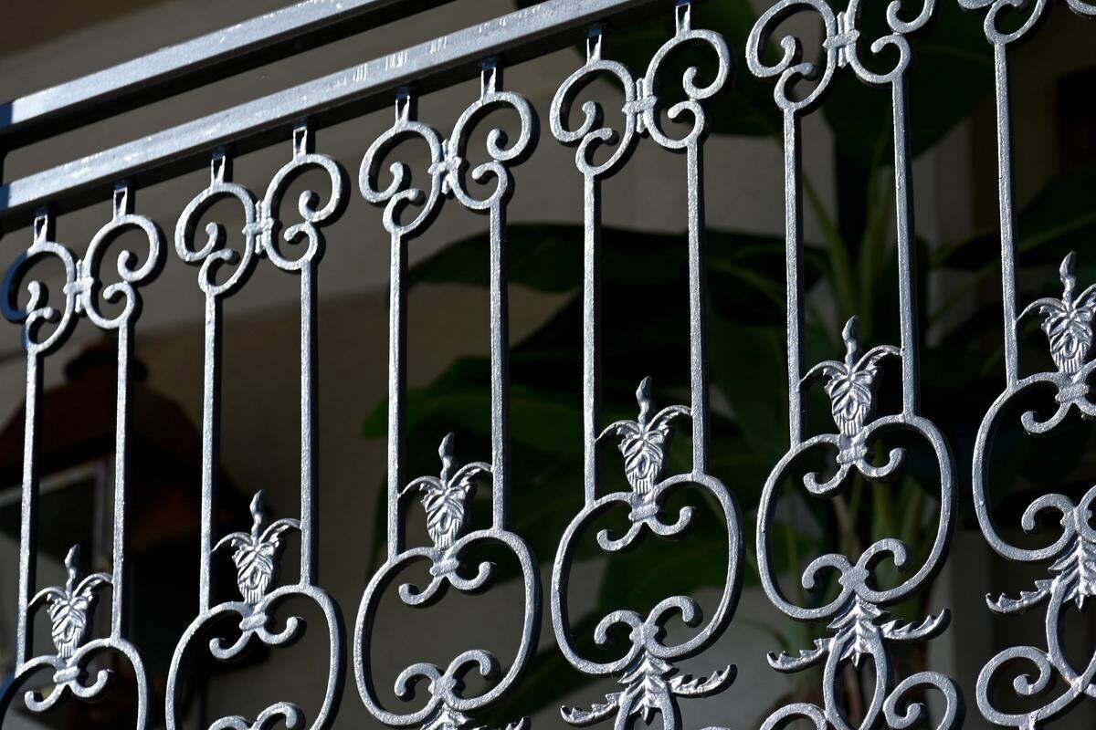 Wrought iron railing on second floor at ‘Orleans on Carroll Street at 807 Carroll St. in downtown Perry.