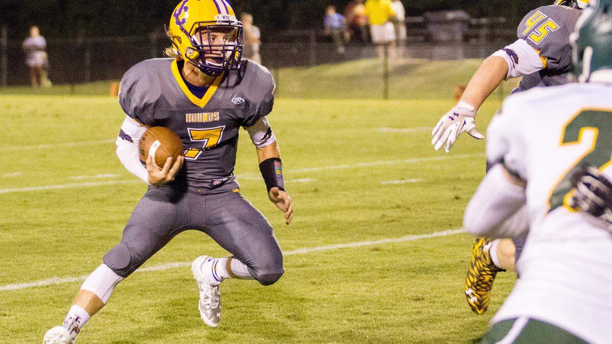 Jones County's Chandler Ramage rushes around end in the first half of their game Friday night.