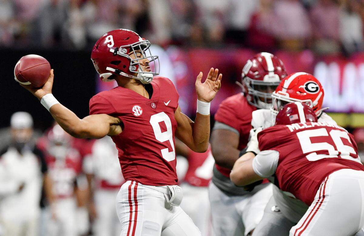 Alabama quarterback Bryce Young (9) throws a deep pass Saturday during the Crimson Tides’ SEC Championship game against Georgia.