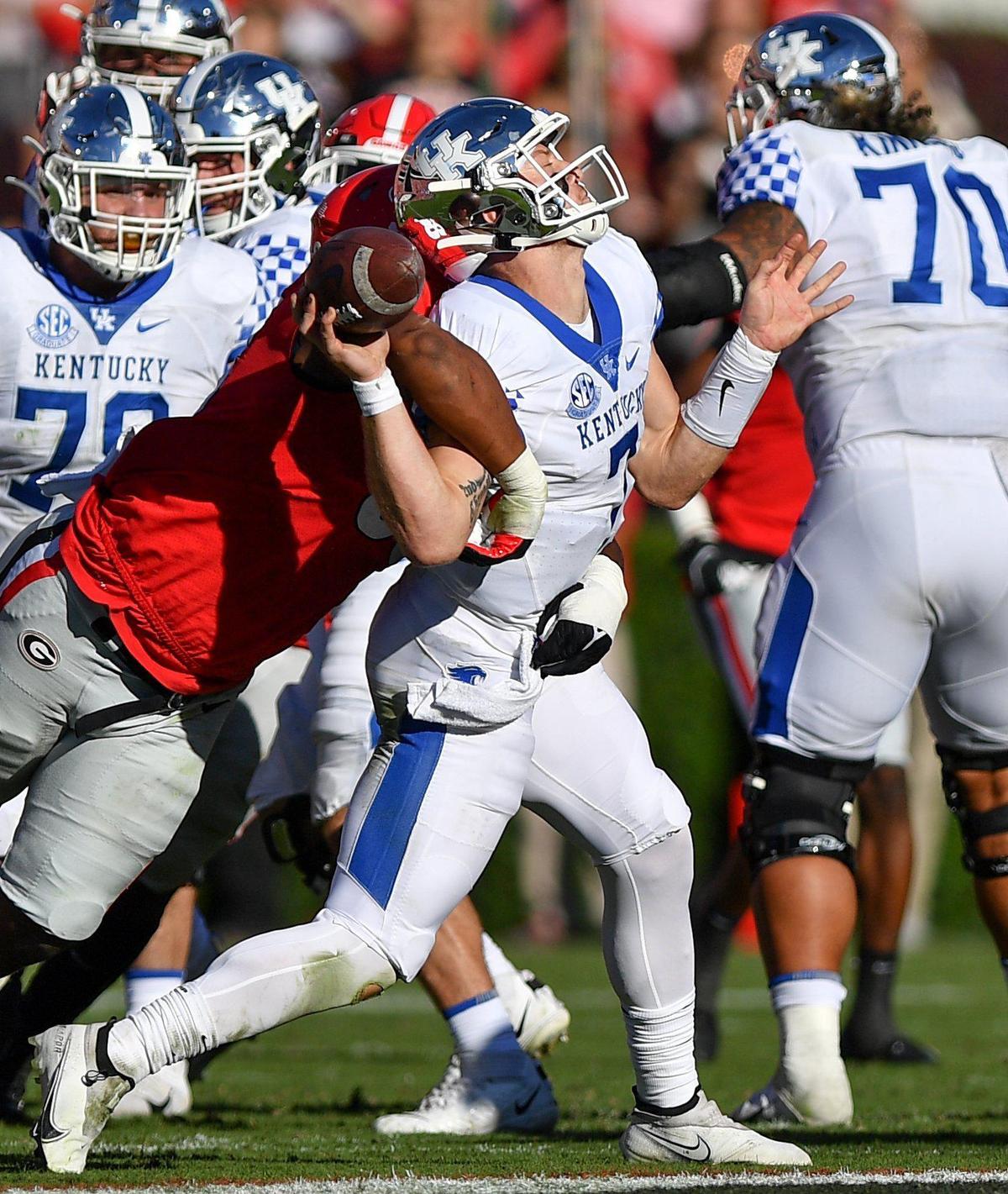 DONN RODENROTH,Athens, Georgia, 10/16/2021: Kentucky quarterback Will Levis gets sacked by a Georgia defender. Georgia beat Kentucky 30-13.