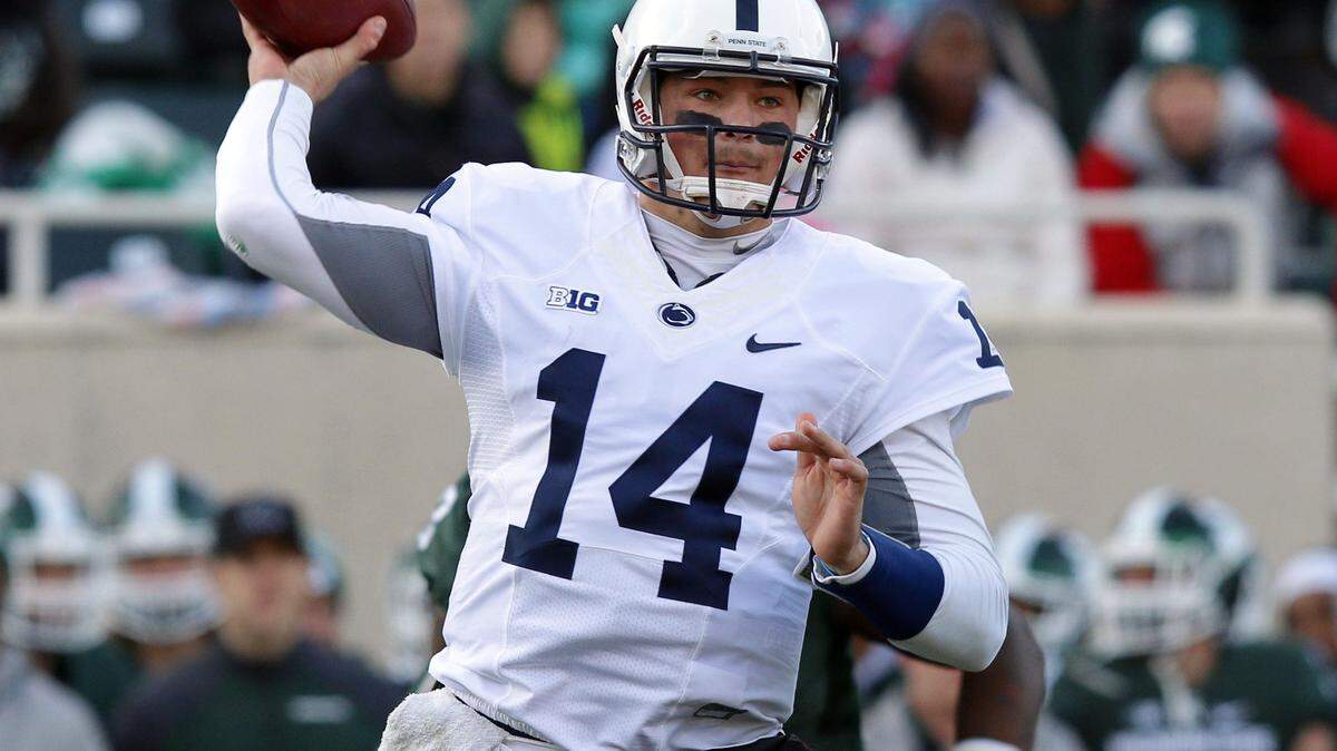 Penn State quarterback Christian Hackenberg throws a pass during the first quarter of an NCAA college football game against Michigan State, Saturday, Nov. 28, 2015, in East Lansing, Mich. (AP Photo/Al Goldis)