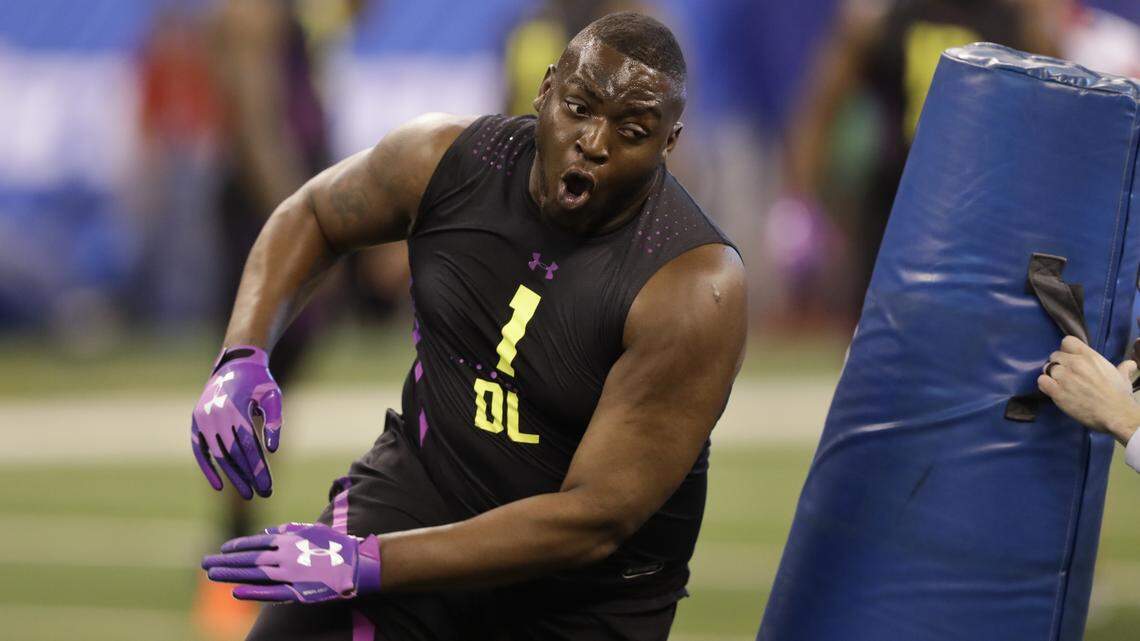 Georgia defensive tackle John Atkins runs through a drill at the NFL combine.