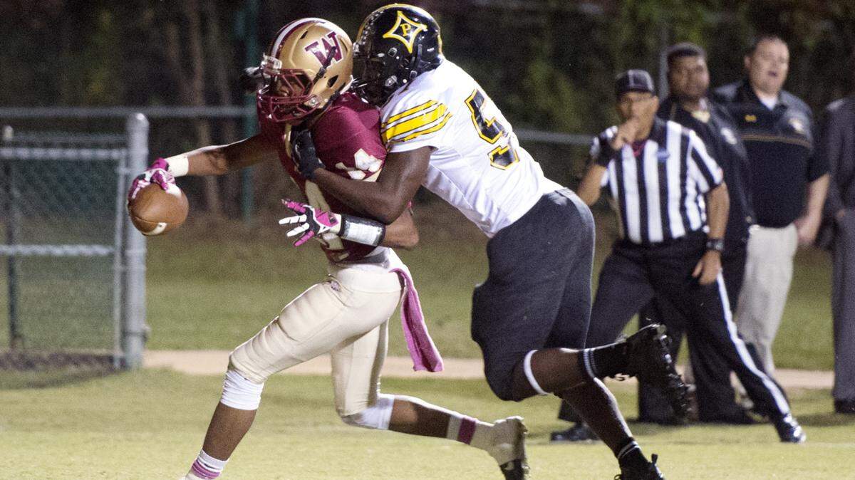 JASON VORHEES/THE TELEGRAPH Macon, GA, 10/30/2015: 
 Westside receiver Tydarius Berrian (14) hauls in a touchdown during their game against Peach County Friday night.