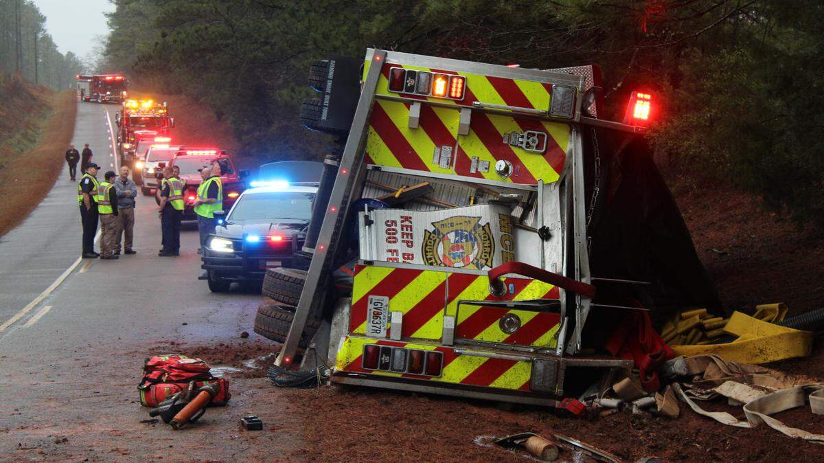 One firefighter was hurt after a fire truck crashed in Monroe County Thursday morning, leading to the back door being damaged and hoses littering the street.