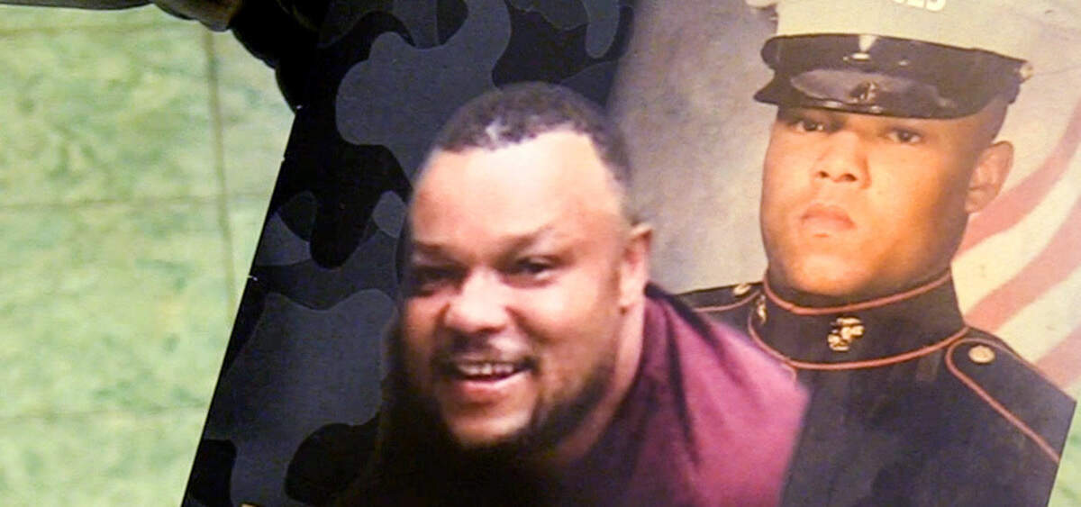 Pictures of Denrick Demond Stallings on a printed program from his funeral.