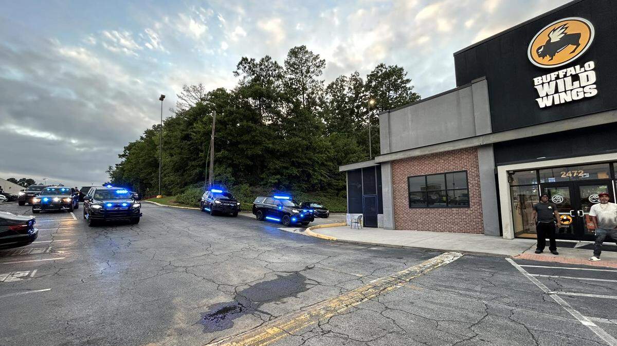 A shooting at Buffalo Wild Wings in Milledgeville, Georgia, left one employee dead. Two suspects were arrested in relation to the alleged murder, police said.