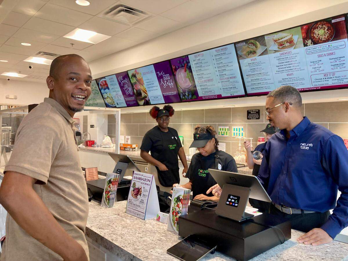 Garrick Jackson looks up while placing an order at the new Nature’s Table restaurant at 718 Spring St., Suite 104, in the retail space below the Lofts at Navicent in Macon.