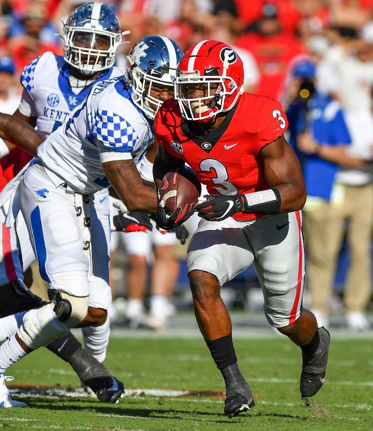 DONN RODENROTH,Athens, Georgia, 10/16/2021: Georgia tailback Zamir White finds a slot and heads for a touchdown against Kentucky Saturday in Athens.