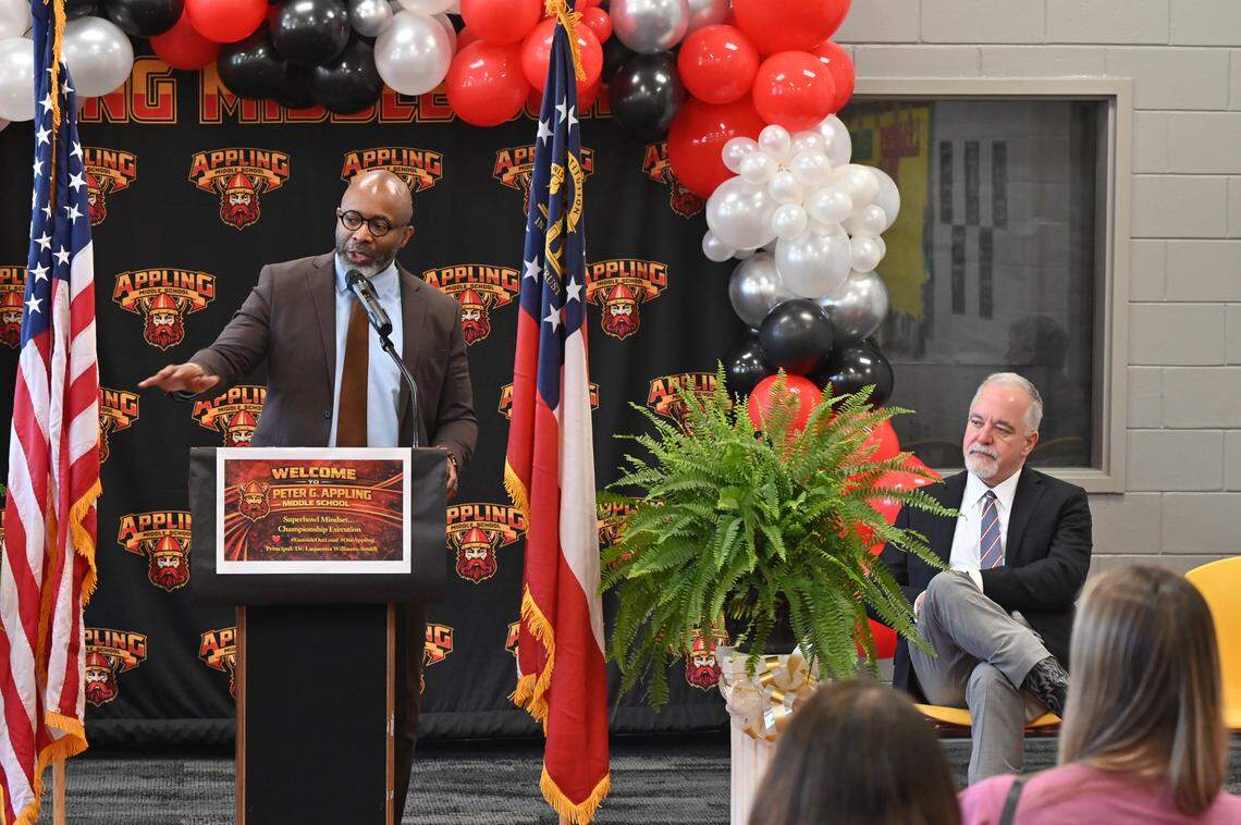 Bibb County Schools Superintendent Dan Sims recognizes Georgia State School Superintendent Richard Woods (right) during an achievement ceremony on Monday, March 2, 2026, at Appling Middle School in Macon, Georgia. Superintendent Woods awarded nine Bibb County schools banners representing growth and achievement in reading and mathematics during the 2024-2025 school year.