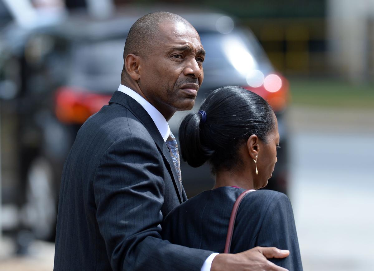 Cliffard Whitby and Shantel King-Whitby leaving U.S. District Court in Macon early in his trial on bribery and money laundering charges