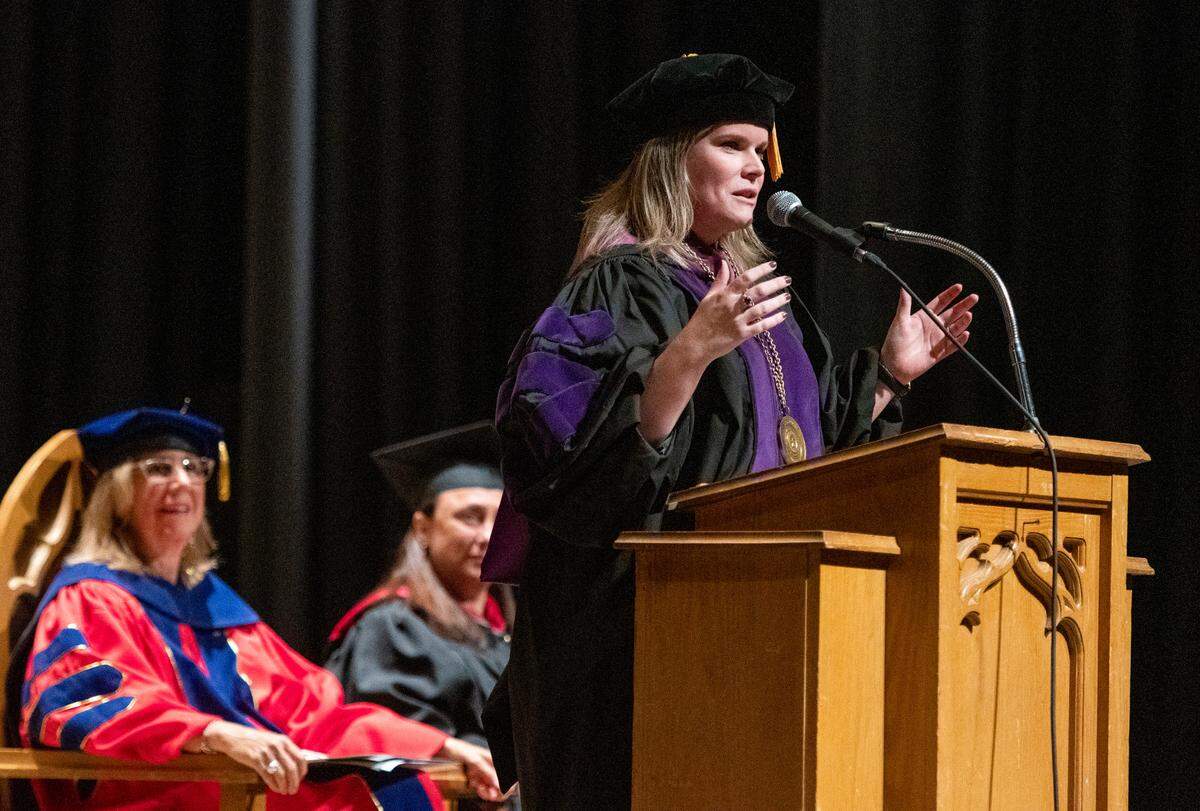 Wesleyan College President Meaghan Blight speaks to new students and their parents during a matriculation ceremony inside Porter Auditorium August 12. Blight became Wesleyan College’s 26th president in July.