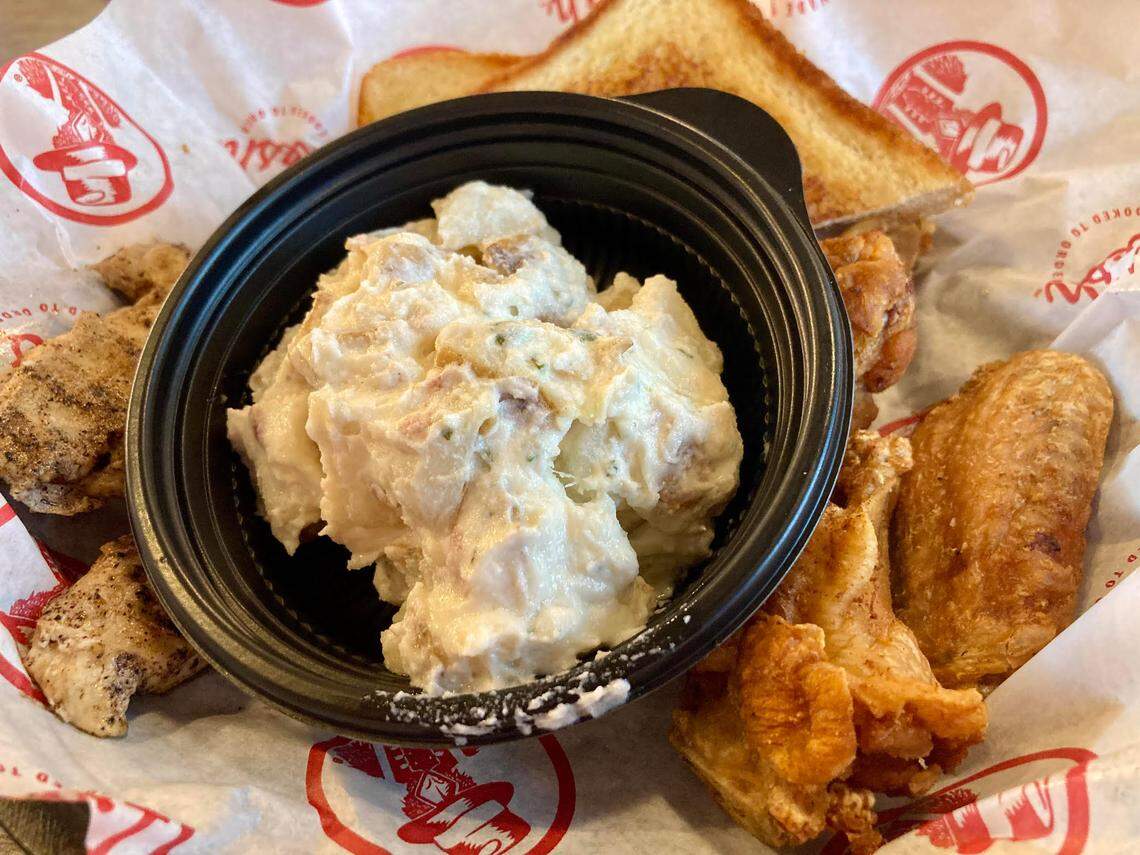 3 Tenders & 3 Wings meal with grilled insted of fried tenders and potato salad instead of fries at a Slim Chickens in Callaway, Florida.