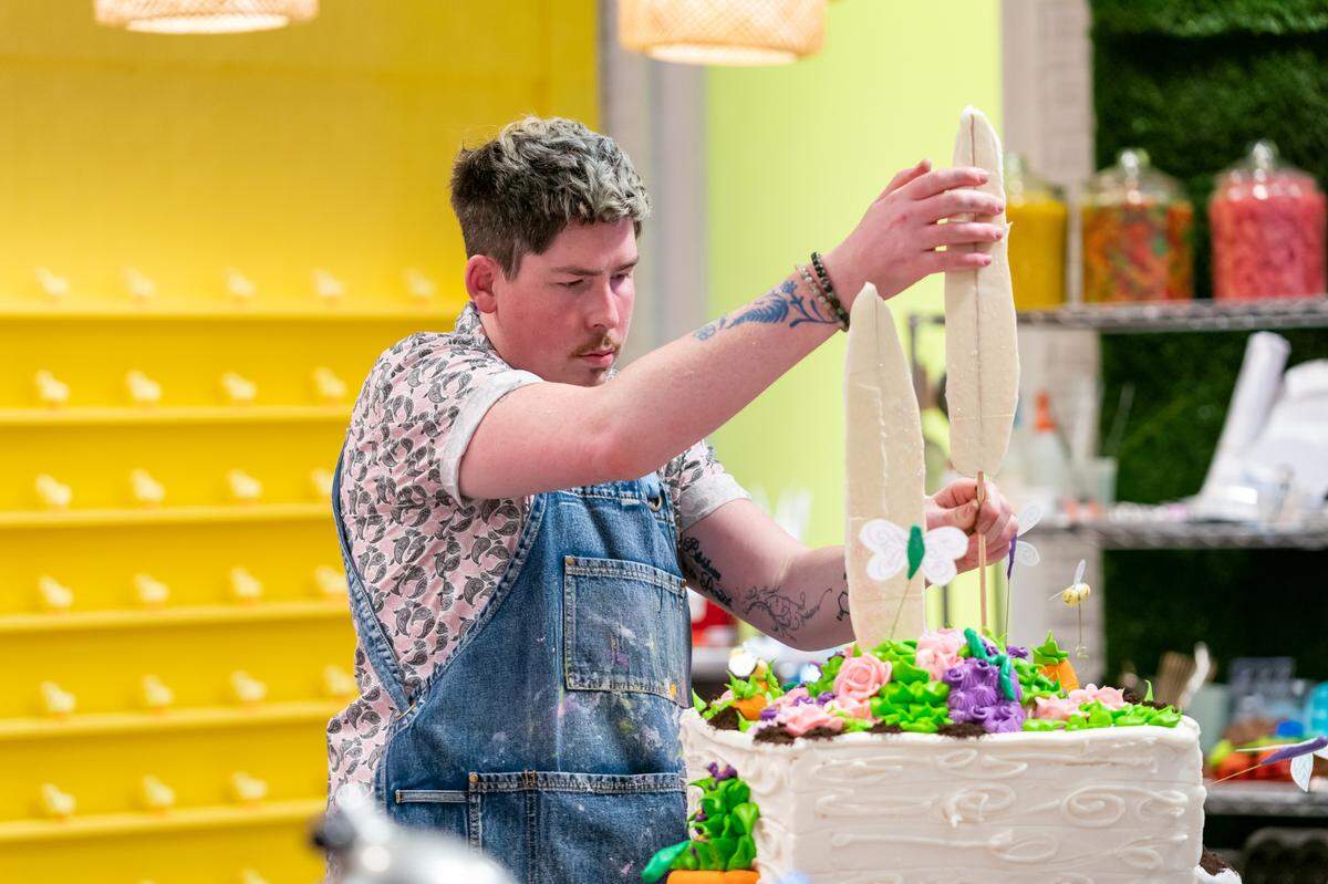 Contestant Timothy Hamrah bakes during Round 2, as seen on Spring Baking Championship: Easter Season 3.