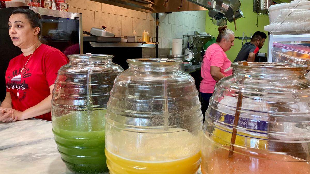 Freshly made agua frescas, a light fruit drink popular in Mexico, are a mainstay at Taqueria la Pina Loka in Warner Robins. The authentic Mexican restaurant in Warner Robins is owned by Beatriz Aguilar, left, and her mom, pink shirt, helps her with the cooking as needed.