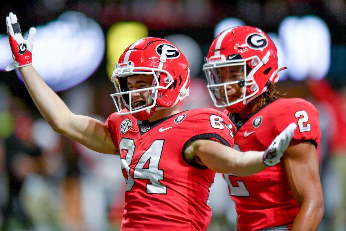 Georgia receiver Ladd McConkey (84) celebrates after a first half touchdown during the Bulldogs’ SEC Championship game against LSU Saturday in Atlanta.