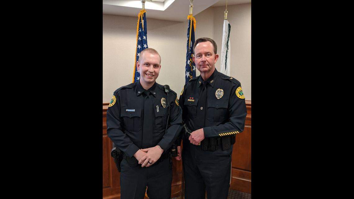 Joe Burson, left, and former Holly Springs Police Chief Mike Carswell after the officer’s swearing in ceremony in March 2020.