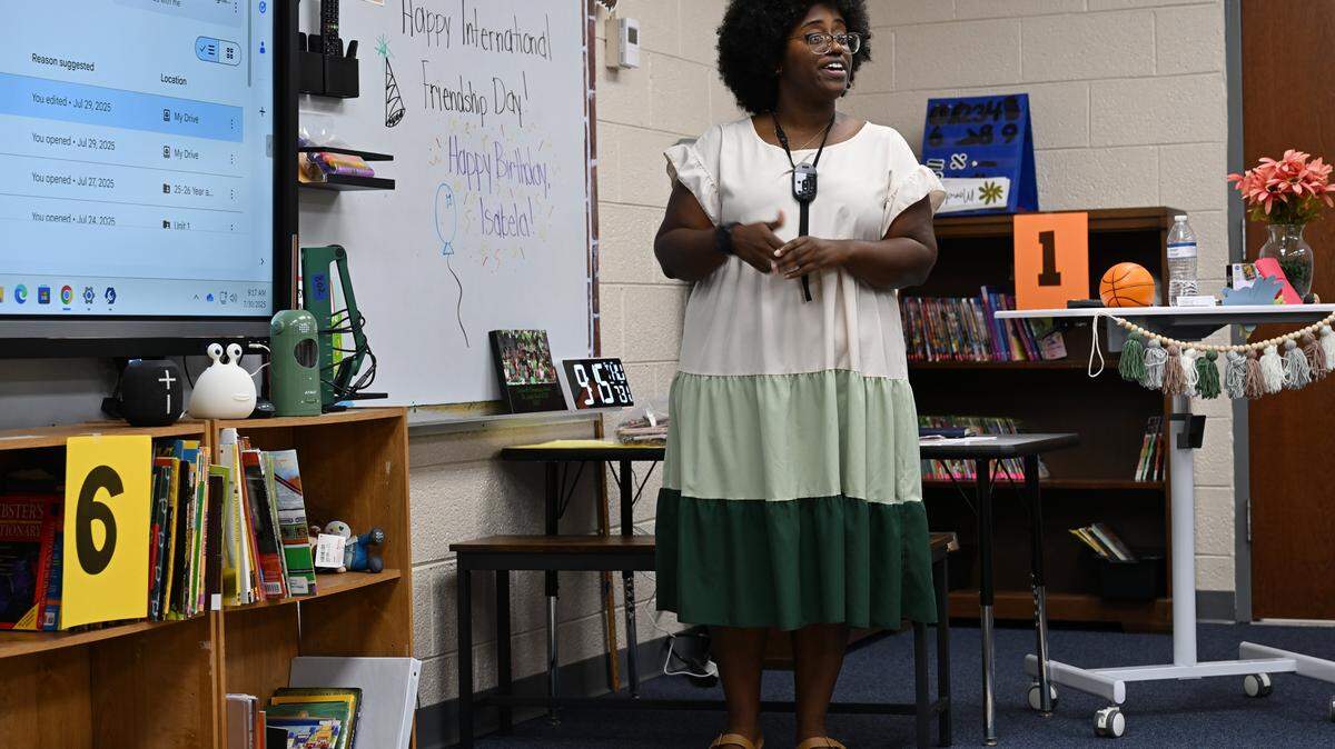 Fifth grade teacher Amber Washington stands in front of her class on the first day of school on Wednesday, July 30, 2025, at Centerville Elementary School in Centerville, Georgia. The Houston County School District awarded Washington District Teacher of the Year for the 2025-2026 school year.