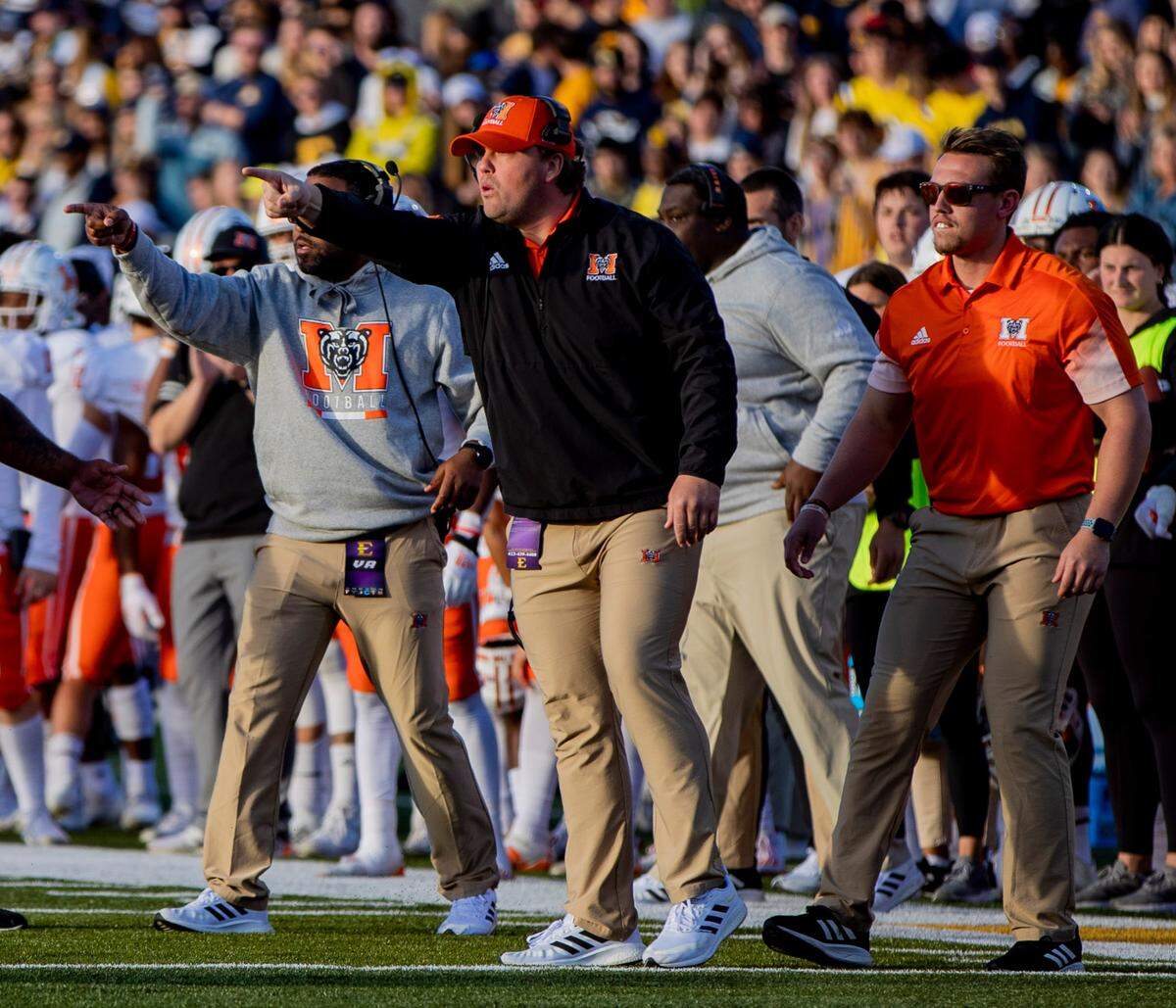 Mercer Head Coach Drew Cronic shouts as his players line up against Eastern Tennessee State Saturday afternoon at William B. Greene Jr. Stadium in Johnson City, Tenn. ETSU defeated Mercer 38-35.
