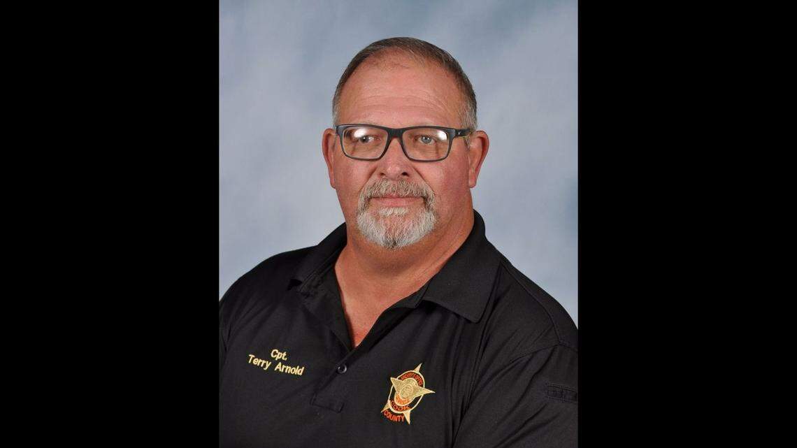 Capt. Terry Arnold suffered a fatal heart attack after he broke up a fight between two students, Georgia officials say.
