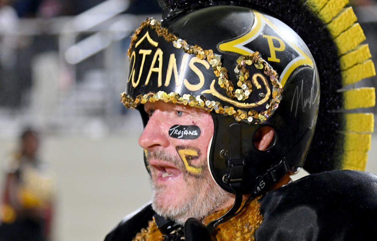 Daryl Hawkins, 67, is in his 31st full season as his alma mater Peach County’s mascot. Hawkins has been roaming the Trojans’ sidelines since the 1992 state championship game.