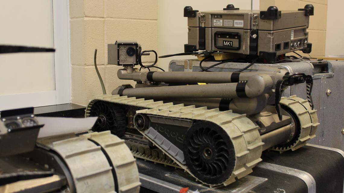 The Warner Robins Police Department SWAT Team deploys robots to negotiate peacefully with suspects in crisis or high risk situations. It moves on a rolling tracker up and downstairs, and communicates with a mic and camera.