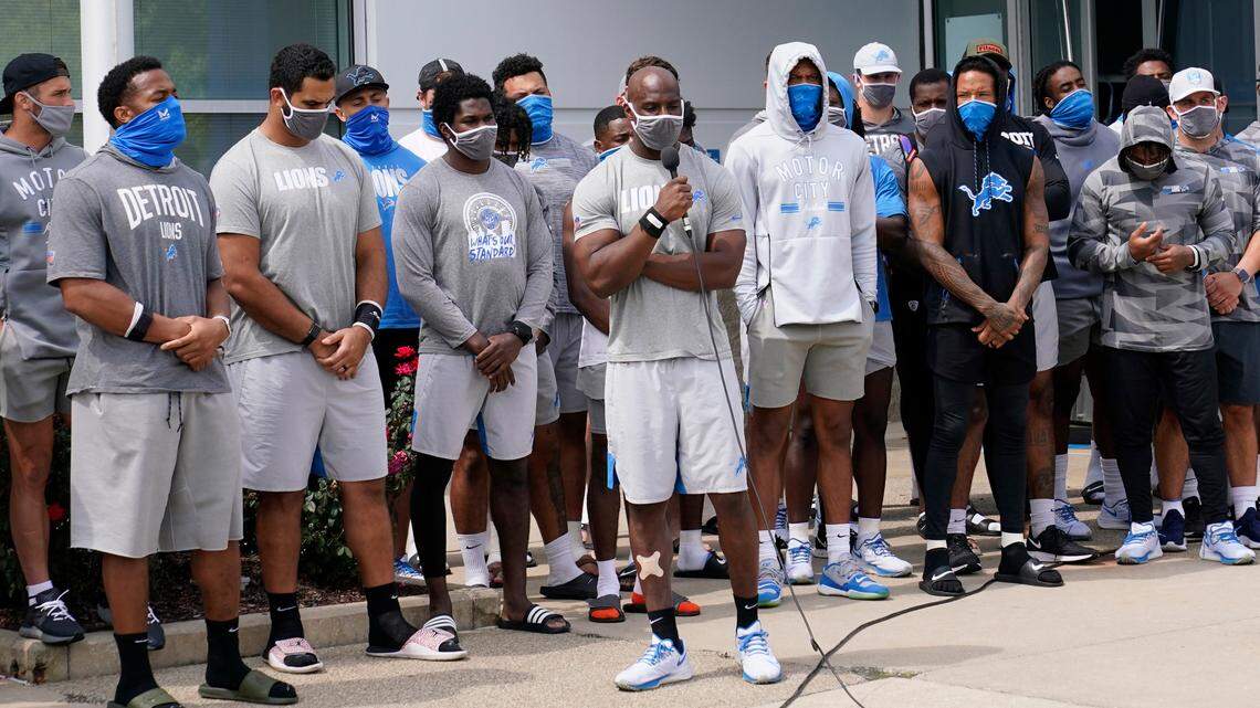 Detroit Lions safety Duron Harmon addresses the media with his teammates outside the Lions NFL football camp practice facility, Tuesday, Aug. 25, 2020, in Allen Park, Mich. The players were reacting to the recent shooting of Jacob Blake in Kenosha, Wis., on Sunday. (AP Photo/Carlos Osorio)