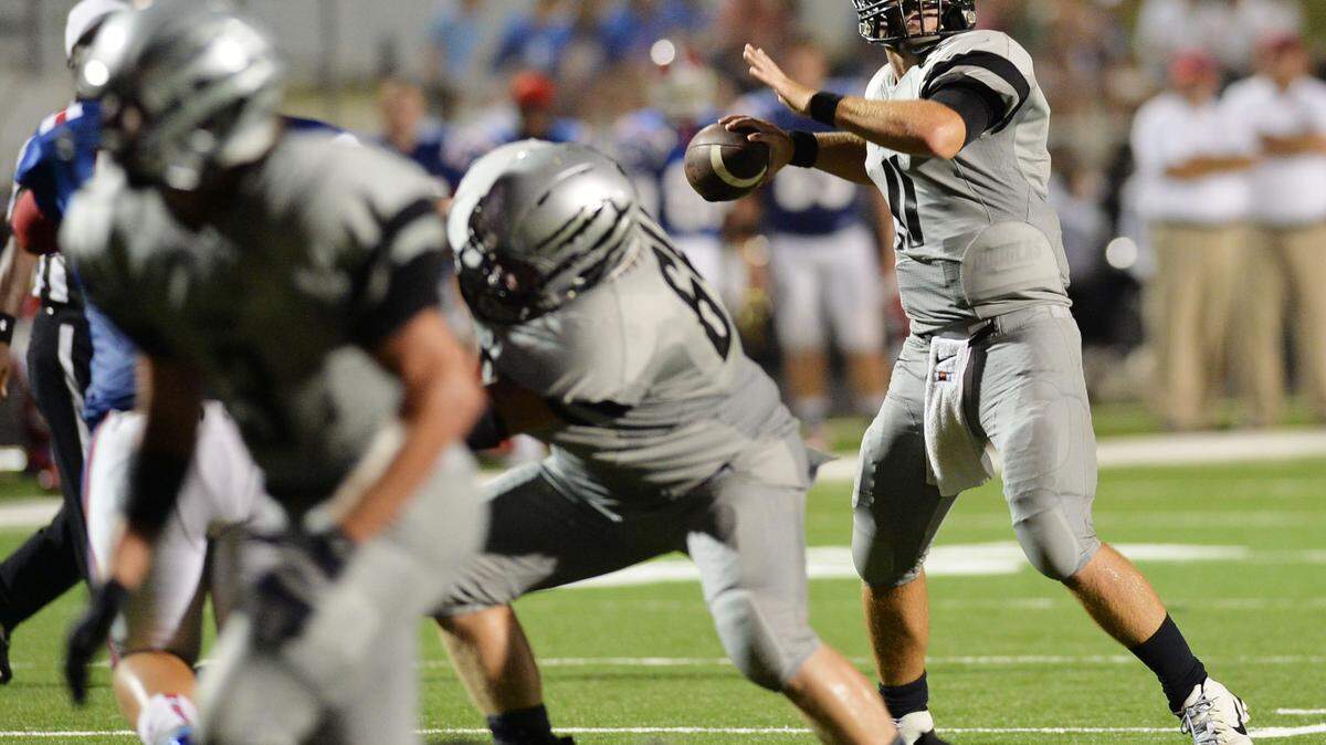 Houston County quarterback Jake Fromm got plenty of protection as he sets to throw toward the end zone at the end of the first half.