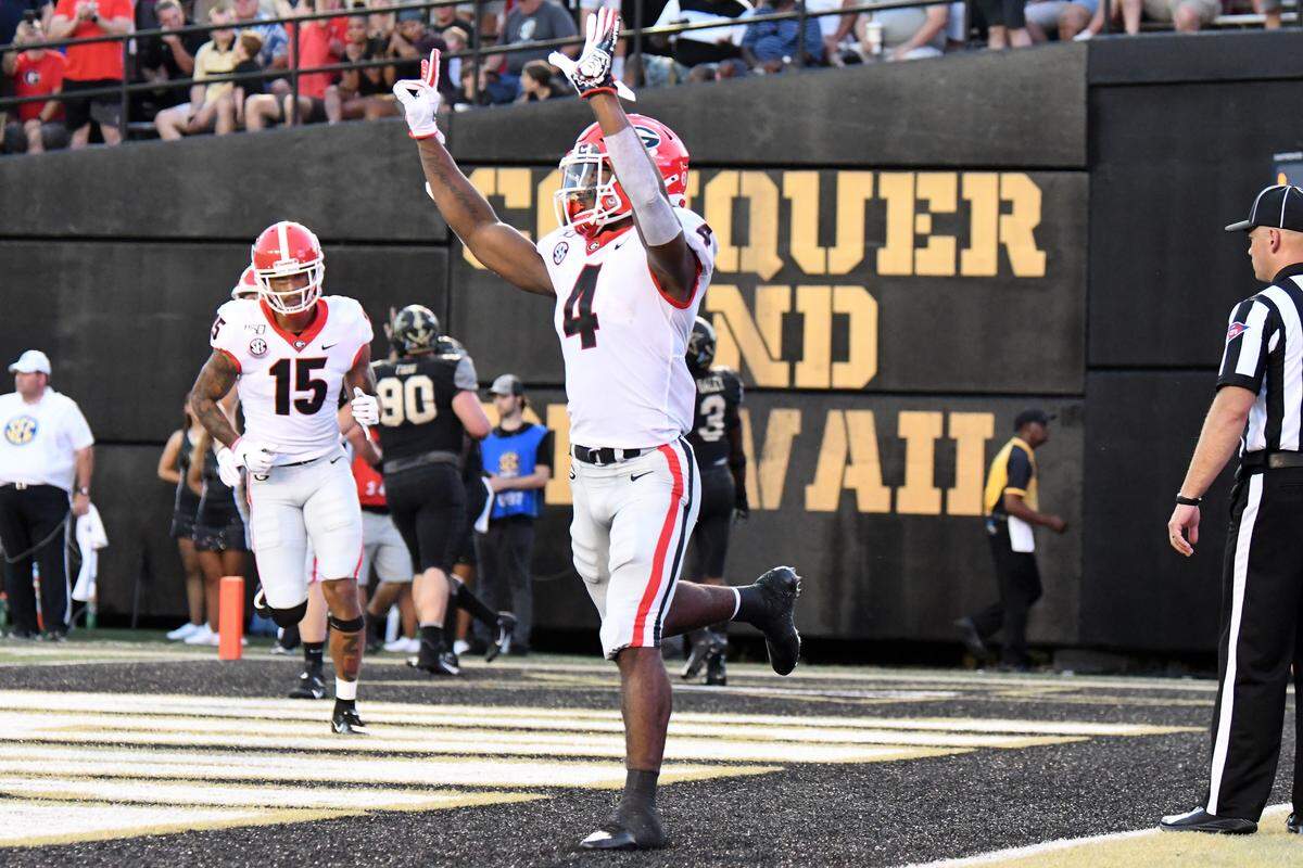 Georgia tailback James Cook (4) during the Bulldogs’ game against the Vanderbilt Commodores at Vanderbilt Stadium in Nashville, Tenn., on Saturday, Aug. 31, 2019.