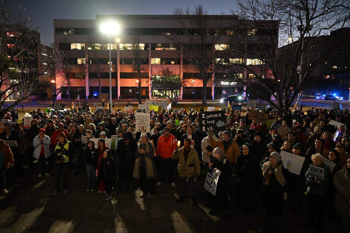 Hundreds of protesters listen to speakers outside the William A. Bootle Federal Building & United States Courthouse during the March on Macon on Wednesday, Jan. 28, 2026, in Macon, Georgia. 