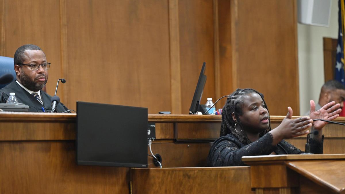 Macon Judicial Circuit Judge Jeffrey Monroe (left) listens as Lateesha Riddle testifies during her immunity hearing at the Bibb County Courthouse on Monday, Jan. 27, 2025 in Macon, Georgia. Judge Monroe denied Riddle’s motion for immunity from prosecution on Monday after hearing multiple testimonies in a 2022 case where Riddle fatally shot her husband, while Riddle said she acted in self-defense.