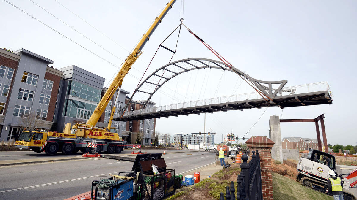 The pedestrian bridge from the Lofts at Mercer Landing to the university campus is part of Macon-Bibb County's Second Street Corridor project and will serve as a "signature gateway" into downtown Macon. The proposed Lofts at Mercer Landing II will be adjacent to the first loft project.