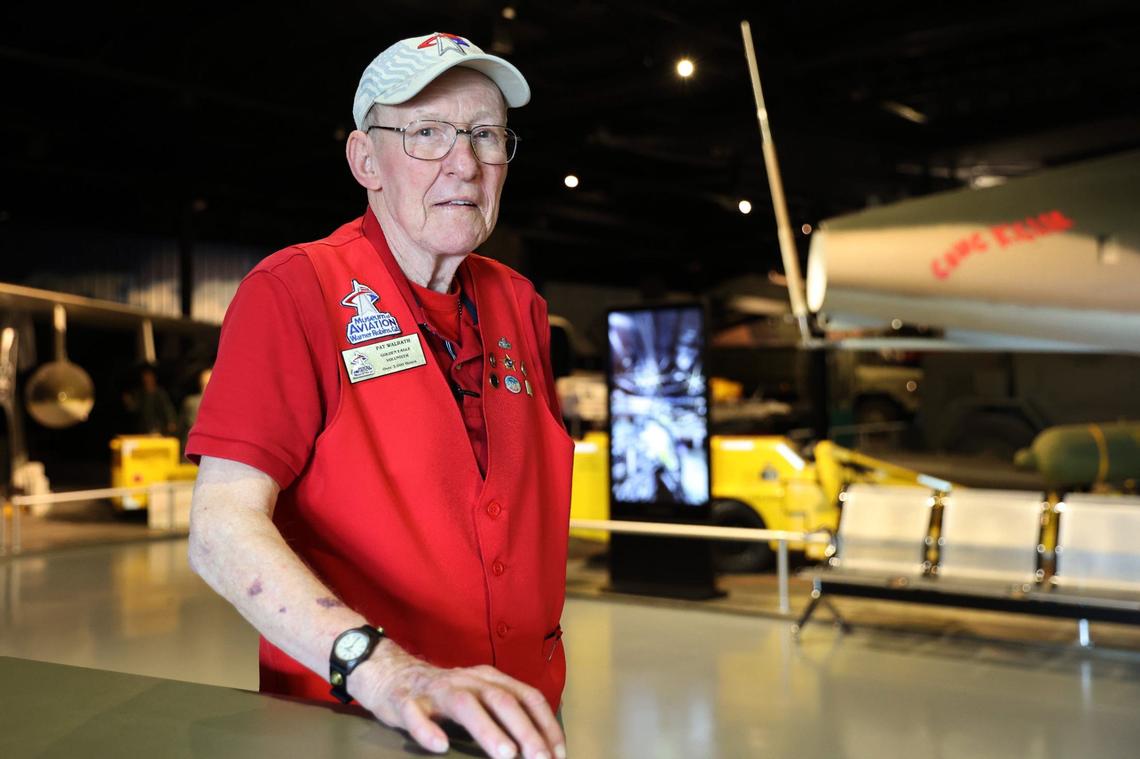 Golden Eagle volunteer Pat Walrath poses in the Nugteren Exhibit Hangar of the Museum of Aviation on Friday, July 26, 2024, in Warner Robins, Georgia. Walrath served in the military for 26 years in both the Marine Corps and the Air Force and has volunteered at the museum for six years.