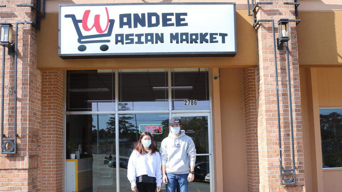 (Left to Right) Nawarat Vibulrungsun and Chatnarin Apirukanotai., owners of Wandee Asian Market. Both are standing in front of their new store located in Macon