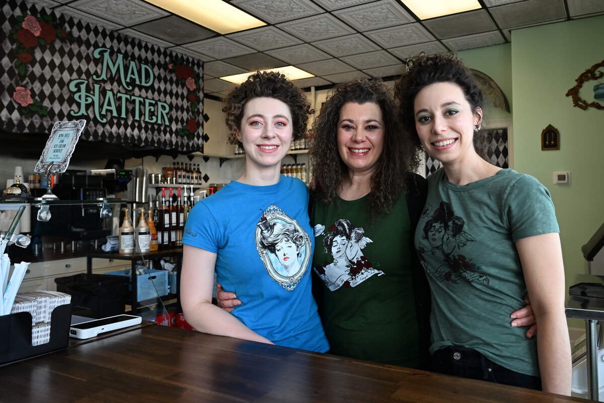 Stephanie Saunders (middle) poses with her daughters Sage Saunders (left) and Drake Saunders behind the counter at their new cafe Mad Hatter Cafe & Confections in Warner Robins. The new Victorian themed cafe and confectionery serves ice cream, baked goods, sandwiches, soups, salads, hand-crafted fizzes and more.