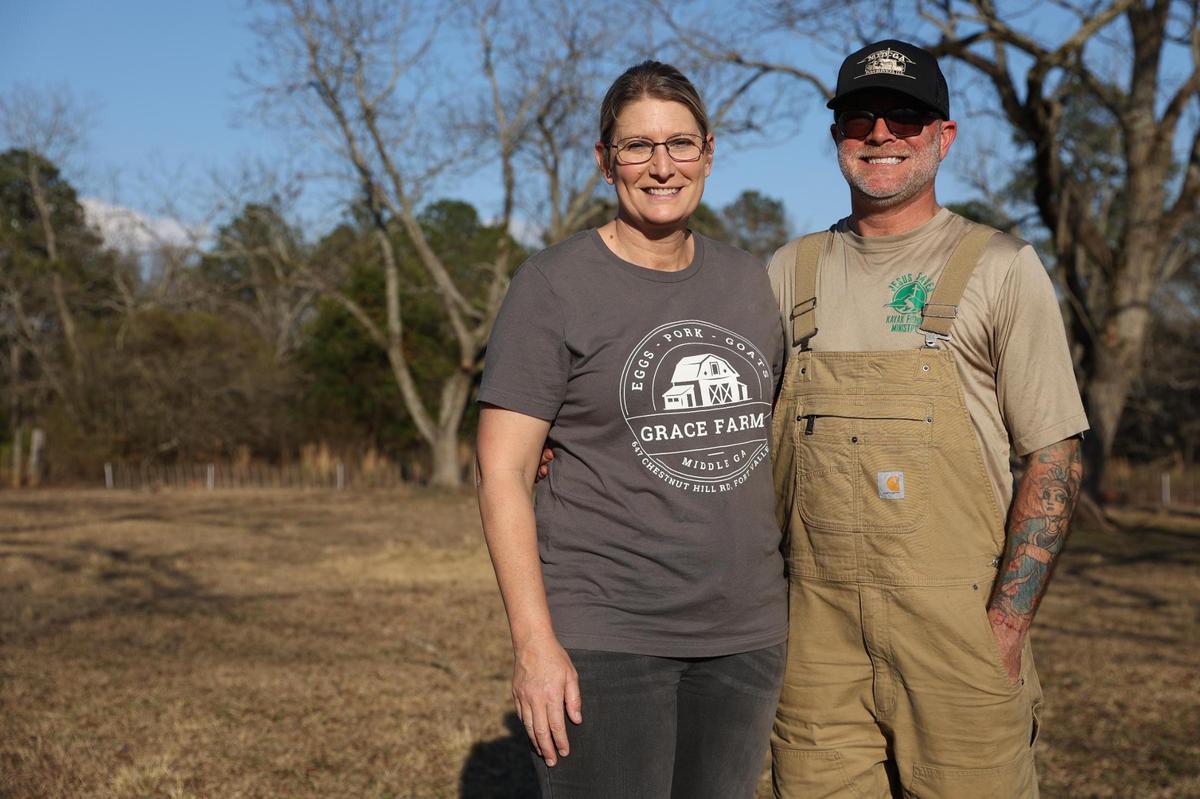 Grace Farms of Middle Georgia owners Melissa (left) and Brandon Haynes pose on their farm on Friday, Feb. 7, 2025, in Fort Valley, Georgia. The most recent outbreak of bird flu has impacted small, organic family farms locally in Middle Georgia, who have seen a surge in sales with low supply state and nationwide.