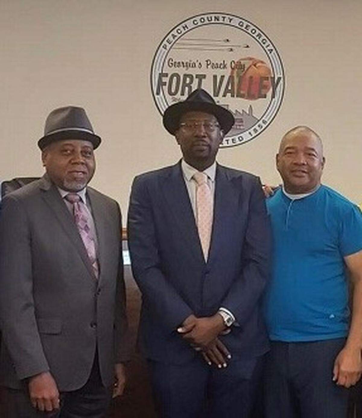 From left, Imola Automotive COO Eric Pettus, Imola CEO Rodney Henry and Fort Valley Mayor Jeffery Lundy meet to discuss bringing Imola’s EV manufacturing plant to Fort Valley.