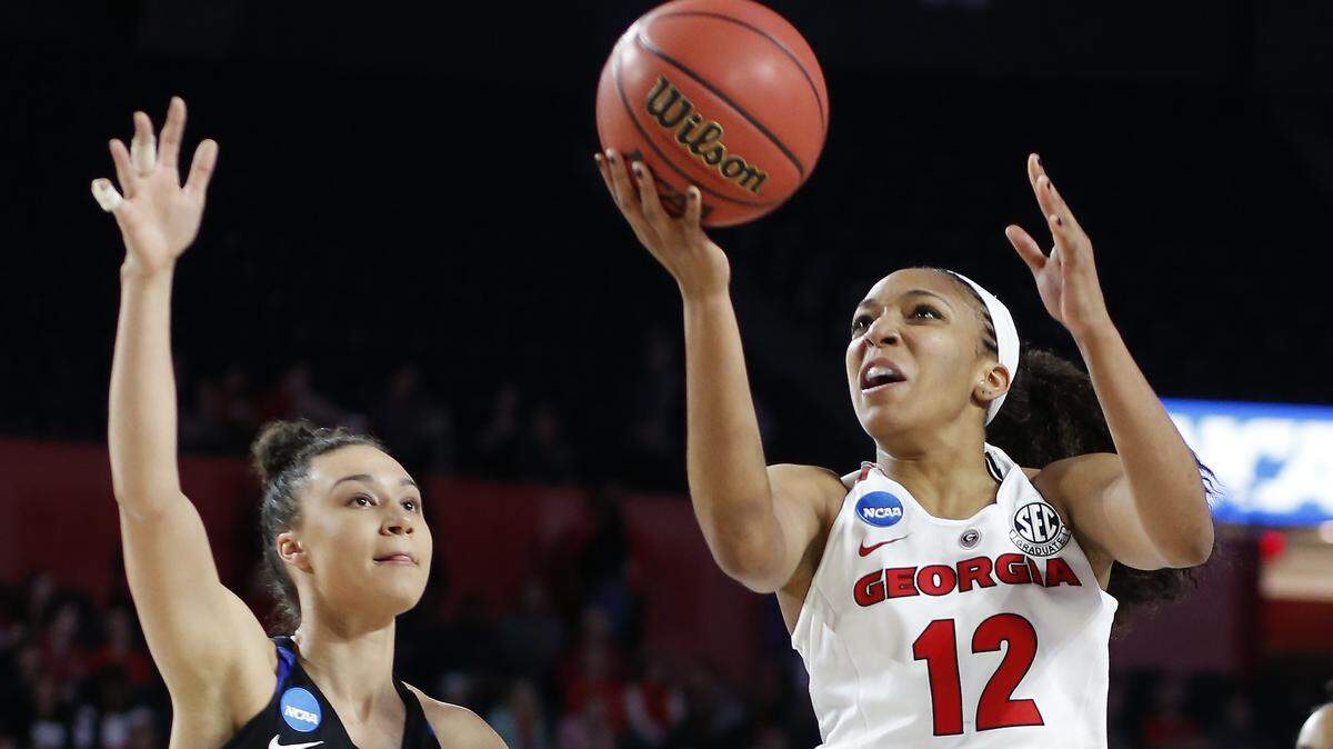Georgia's Haley Clark puts up a shot against Duke's Faith Suggs during the second round of the NCAA Touranment.