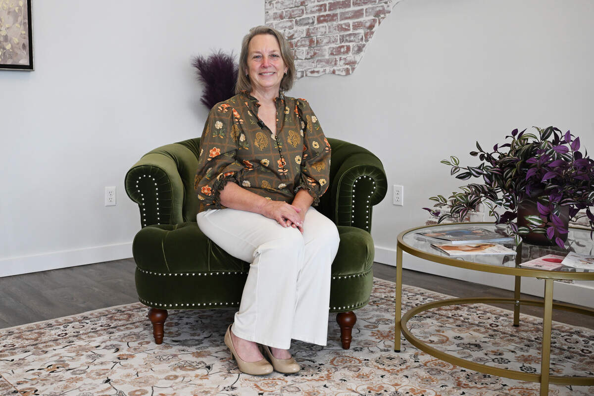 Elegant Essentials owner Beth Strickland poses inside of her bra-fitting salon on Monday, July 7, 2026, in Warner Robins, Ga. Strickland opened her salon in May with an aim of helping women find the right fit with a wide range of sizes and specialty bras.