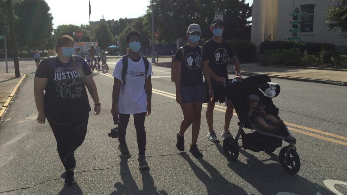 Some participants wore T-shirts to express their views during Saturday’s Freedom for All Macon Solidarity Run + Walk 4K in downtown Macon.