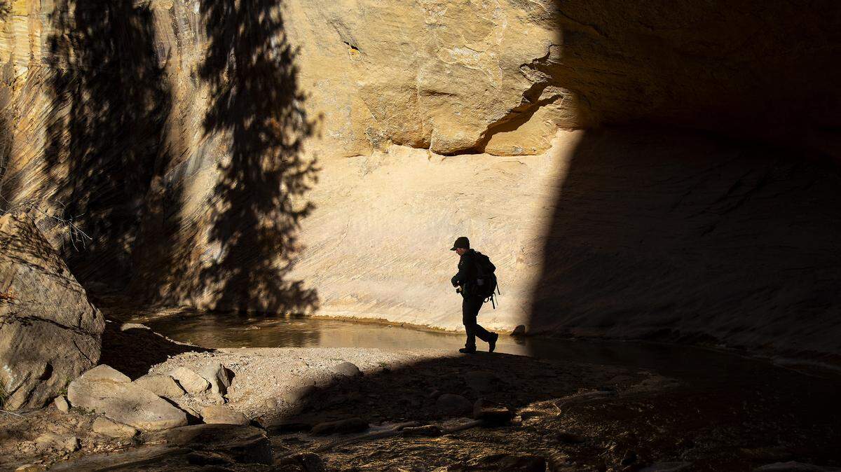 A ranger follows the Virgin River in Utah.
