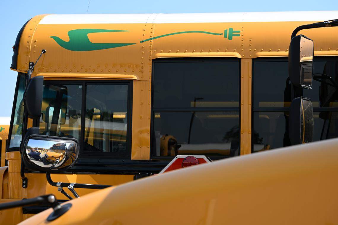 A green Blue Bird Corporation logo is displayed on one of the new all-electric Bibb County School District buses on Thursday, April 23, 2026, at the district bus depot in Macon, Georgia. The Blue Bird manufacturing plant in Fort Valley built the new all-electric bus fleet, which includes 15 buses.