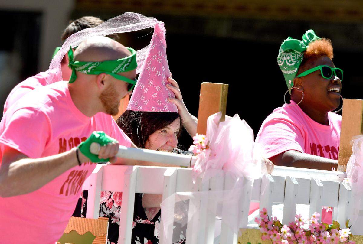 The Mattress Firm bed races down Cherry Street during the Cherry Blossom Festival Bed Race last year.